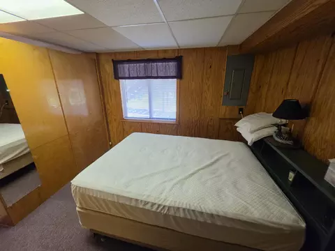 Bedroom - 1470 Helmer Lake Rd, Fairview, MI 48621 photo 11 of 11