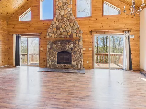 Living - 11302 Whisper Dr, Frederic, MI 49733 photo 1 of 4