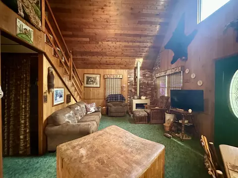 Living - 2410 N Manistee River Rd, Grayling, MI 49738 photo 1 of 4