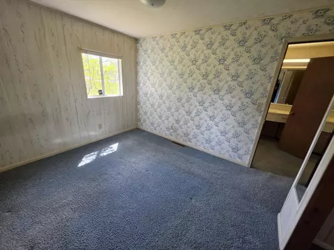 Bedroom - 2056 E Miller Rd, Fairview, MI 48621 photo 2 of 5