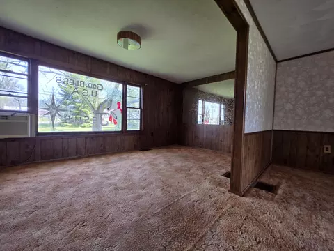Living - 2056 E Miller Rd, Fairview, MI 48621 photo 2 of 8