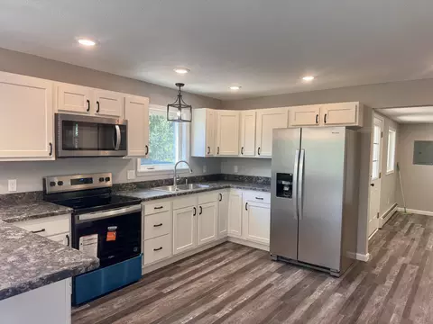 Kitchen - 2219 Pearsall Rd, Fairview, MI 48621 photo 2 of 3