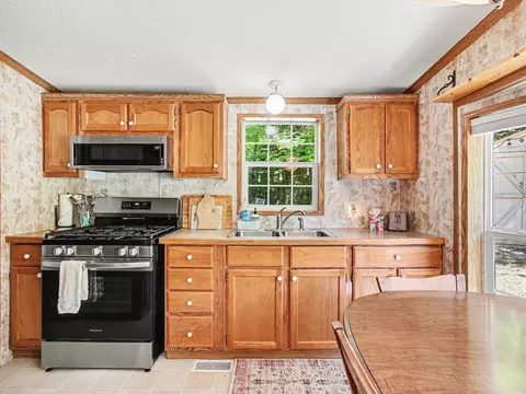 Kitchen - 4460 Ford Rd, Wolverine, MI 49799 photo 2 of 4