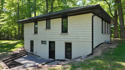 Exterior - 1351 Cedar Ct, Gladwin, MI 48624 photo 5 of 11