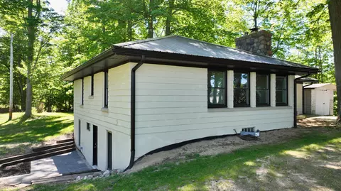 Exterior - 1351 Cedar Ct, Gladwin, MI 48624 photo 4 of 11