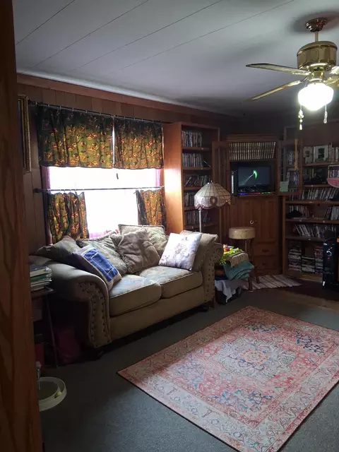 Living - 3129 Oaks Rd, Fairview, MI 48621 photo 1 of 2