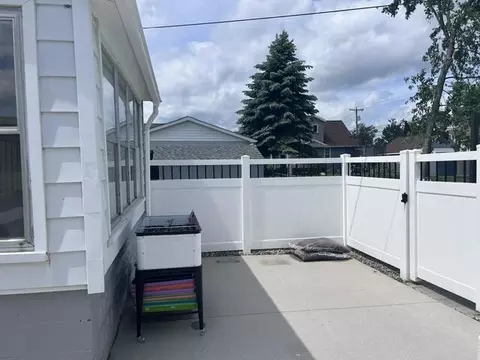Exterior - 213 E Wisner St, Alpena, MI 49707 photo 9 of 14