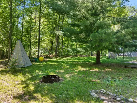 Exterior - 124 Bourbon St, Roscommon, MI 48653 photo 2 of 11