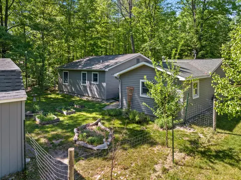 Exterior - 124 Bourbon St, Roscommon, MI 48653 photo 5 of 11