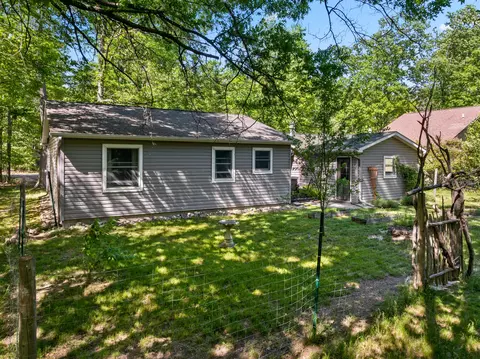 Exterior - 124 Bourbon St, Roscommon, MI 48653 photo 9 of 11