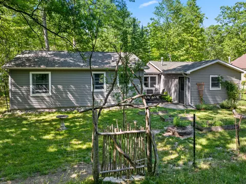 Exterior - 124 Bourbon St, Roscommon, MI 48653 photo 3 of 11