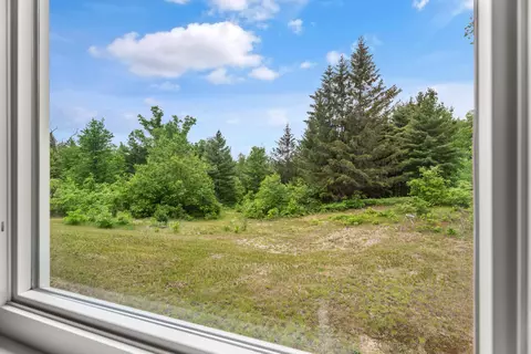 Exterior - 2401 Pearsall Rd, Fairview, MI 48621 photo 7 of 10