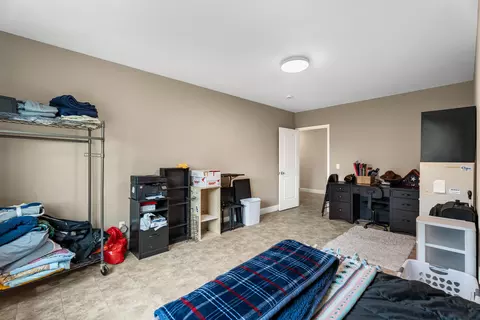 Bedroom - 2401 Pearsall Rd, Fairview, MI 48621 photo 6 of 7