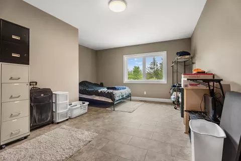 Bedroom - 2401 Pearsall Rd, Fairview, MI 48621 photo 4 of 7