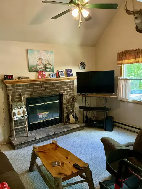 Living - 11285 Pebble Dr, Roscommon, MI 48653 photo 2 of 3