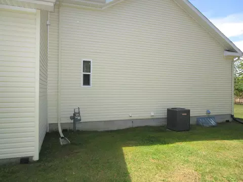 Exterior - 7830 Red Pine Trl, Alanson, MI 49706 photo 6 of 7