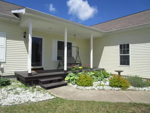 Exterior - 7830 Red Pine Trl, Alanson, MI 49706 photo 3 of 7
