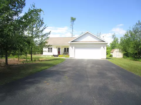 Exterior - 7830 Red Pine Trl, Alanson, MI 49706 photo 2 of 7