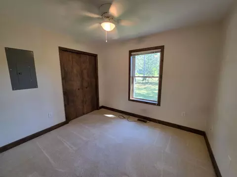 Bedroom - 1025 Robin Hood Dr, Fairview, MI 48621 photo 1 of 9