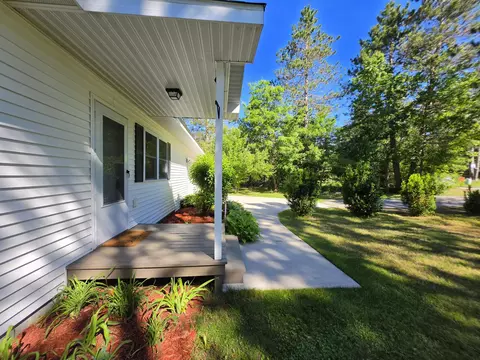 Exterior - 1025 Robin Hood Dr, Fairview, MI 48621 photo 2 of 28