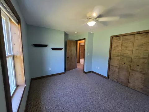 Bedroom - 1025 Robin Hood Dr, Fairview, MI 48621 photo 5 of 9