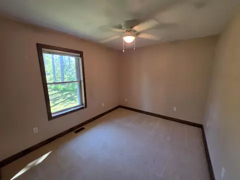 Bedroom - 1025 Robin Hood Dr, Fairview, MI 48621 photo 7 of 9