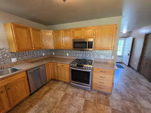 Kitchen - 1025 Robin Hood Dr, Fairview, MI 48621 photo 3 of 5