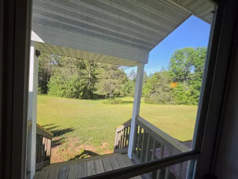 Exterior - 1025 Robin Hood Dr, Fairview, MI 48621 photo 5 of 28