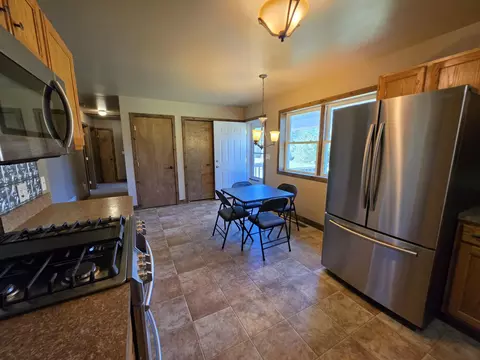 Kitchen - 1025 Robin Hood Dr, Fairview, MI 48621 photo 4 of 5