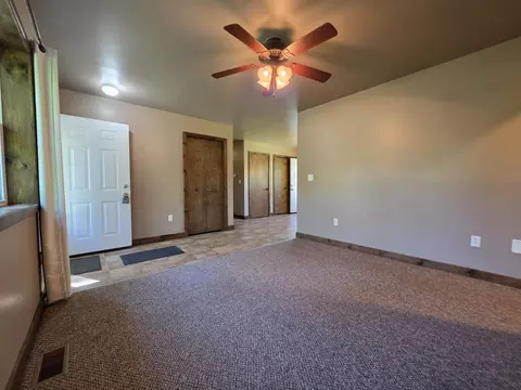 Living - 1025 Robin Hood Dr, Fairview, MI 48621 photo 2 of 2