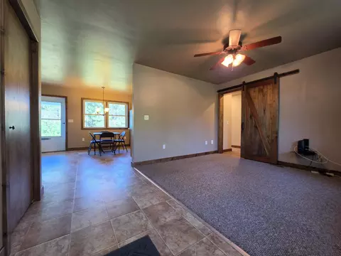 Living - 1025 Robin Hood Dr, Fairview, MI 48621 photo 1 of 2