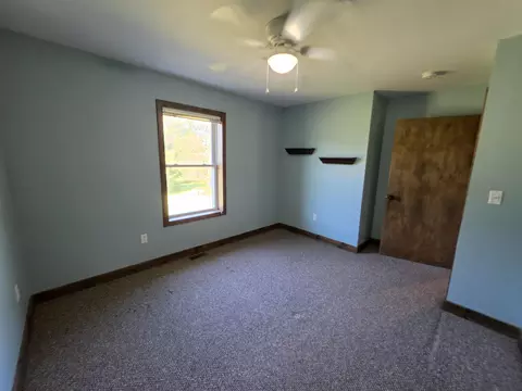 Bedroom - 1025 Robin Hood Dr, Fairview, MI 48621 photo 6 of 9
