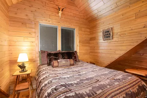 Bedroom - 23 Treasure Is, Roscommon, MI 48653 photo 3 of 4