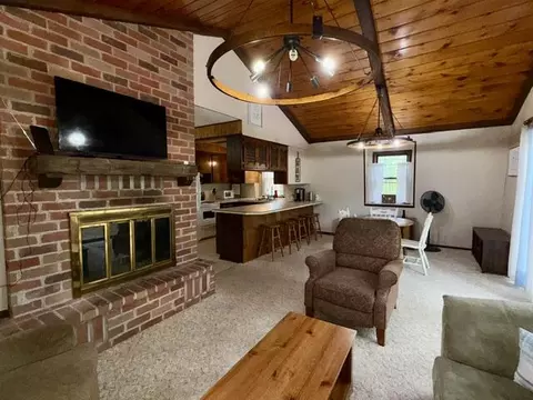 Living - 237 Quail Blvd, Roscommon, MI 48653 photo 1 of 3