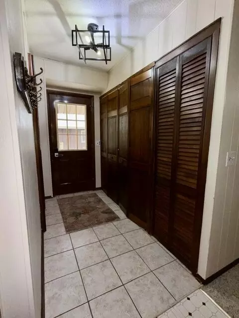 Entry Way - 237 Quail Blvd, Roscommon, MI 48653 photo 1 of 2