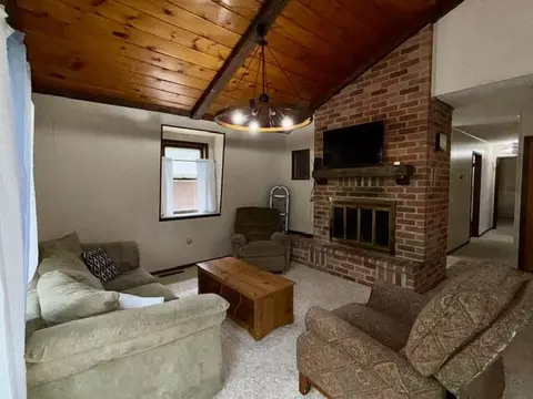 Living - 237 Quail Blvd, Roscommon, MI 48653 photo 2 of 3