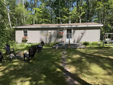 Exterior - 7992 E Sturgeon Valley Rd, Vanderbilt, MI 49795 photo 6 of 8