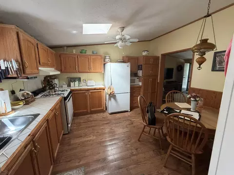Kitchen - 7992 E Sturgeon Valley Rd, Vanderbilt, MI 49795 photo 2 of 2