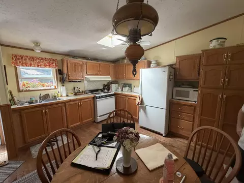 Kitchen - 7992 E Sturgeon Valley Rd, Vanderbilt, MI 49795 photo 1 of 2