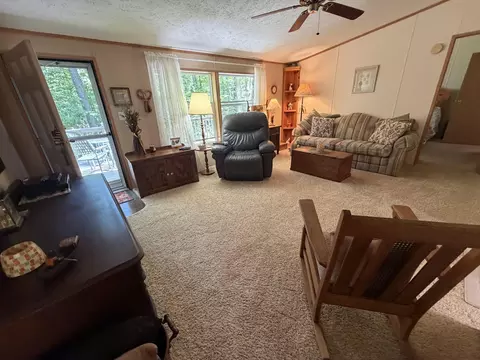 Living - 7992 E Sturgeon Valley Rd, Vanderbilt, MI 49795 photo 1 of 2