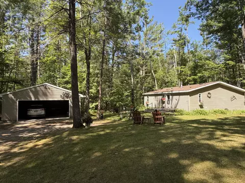 Exterior - 7992 E Sturgeon Valley Rd, Vanderbilt, MI 49795 photo 4 of 8