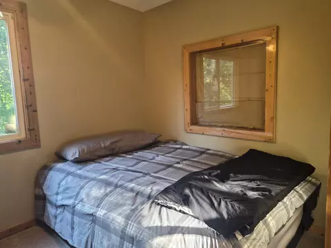 Bedroom - 10870 Sutters Mill Rd, Frederic, MI 49733 photo 2 of 6