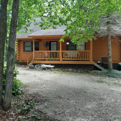 9483 Whispering Pines Dr, Mancelona, MI 49659