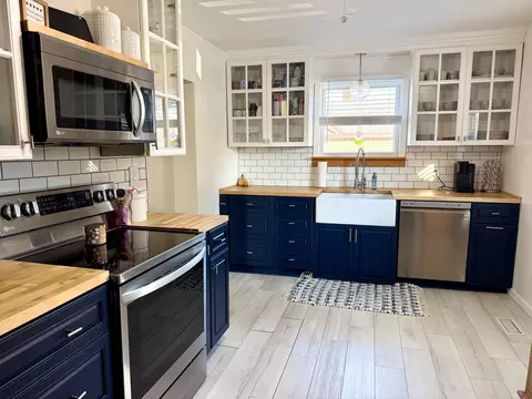 Kitchen - 108 E Baldwin St, Alpena, MI 49707 photo 2 of 3
