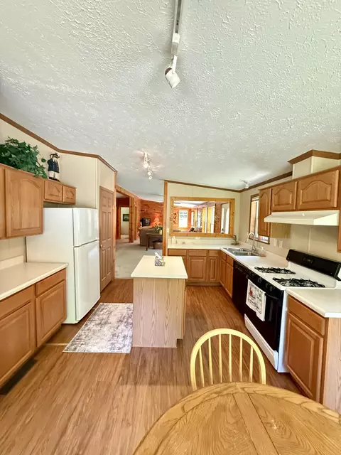 Kitchen - 11263 Wilderness Trl, Vanderbilt, MI 49795 photo 2 of 4