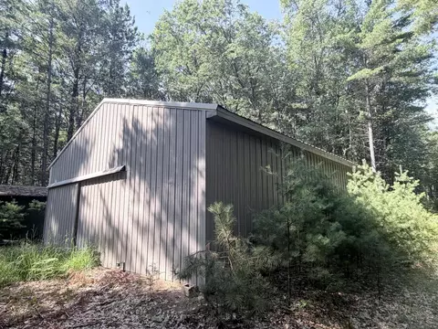 Exterior - 10870 Thoman Trl, Roscommon, MI 48653 photo 4 of 10