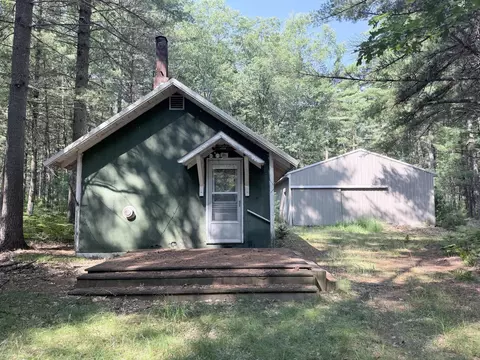 Exterior - 10870 Thoman Trl, Roscommon, MI 48653 photo 2 of 10