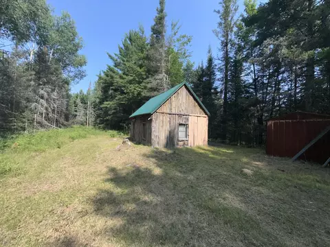 Exterior - 4986 Haskell Dr, Lewiston, MI 49756 photo 3 of 7