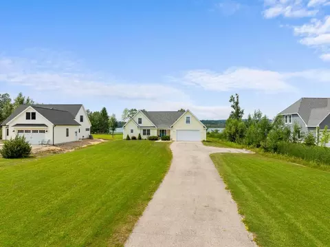 Exterior - 6097 Summerside Dr, Alanson, MI 49706 photo 2 of 9
