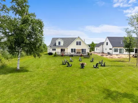 Exterior - 6097 Summerside Dr, Alanson, MI 49706 photo 4 of 9